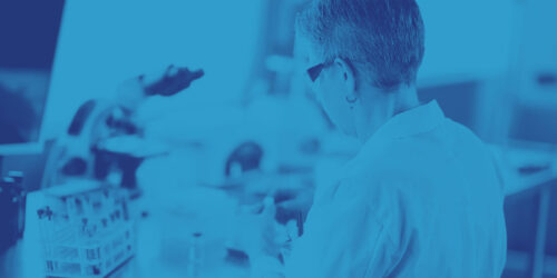 Female technician in lab analyzing sample