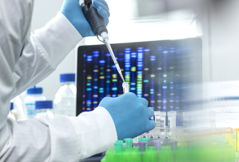 Scientist pipetting sample