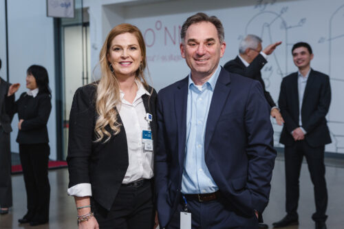 Female and male employees at company event