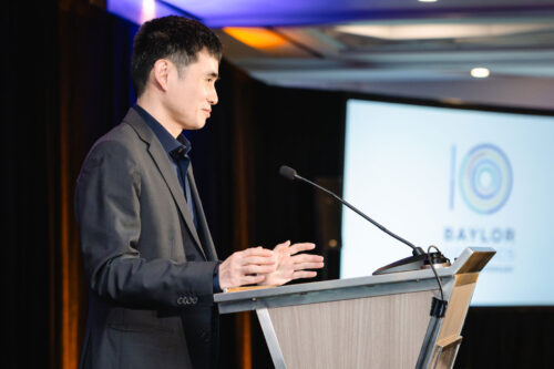 Male speaking at podium