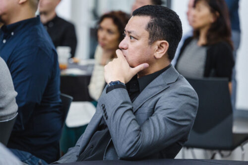 Group of people listening at an event